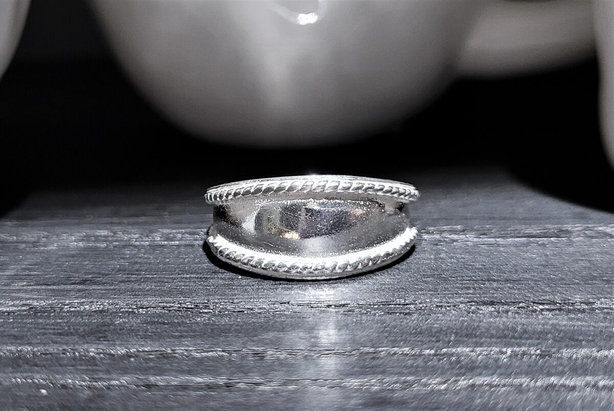 Silver Ring With Braided Eadges