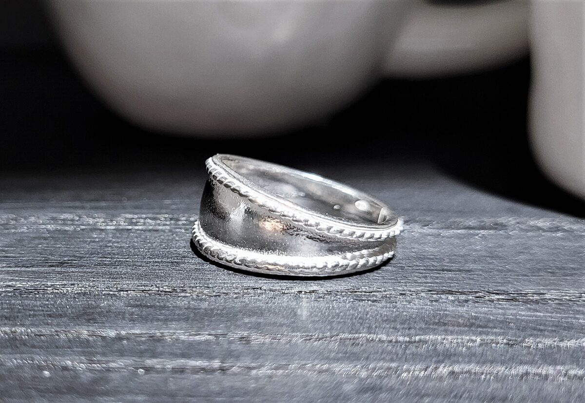 Silver Ring With Braided Eadges