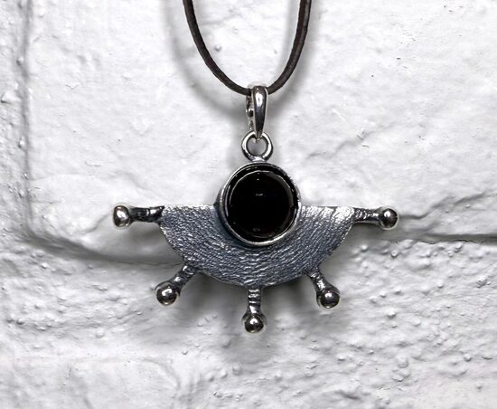 Silver Pendant "Spring Wind" (dark red amber)