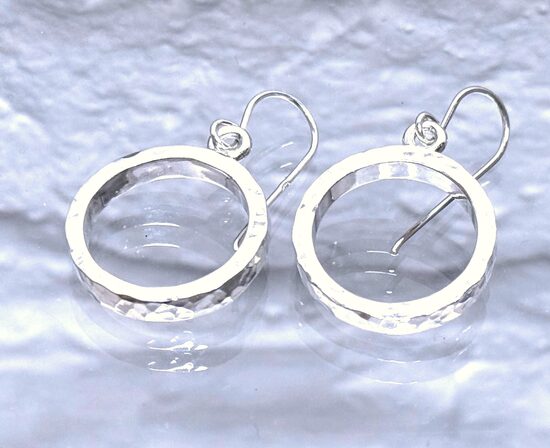Contemporary silver earrings with a textured surface