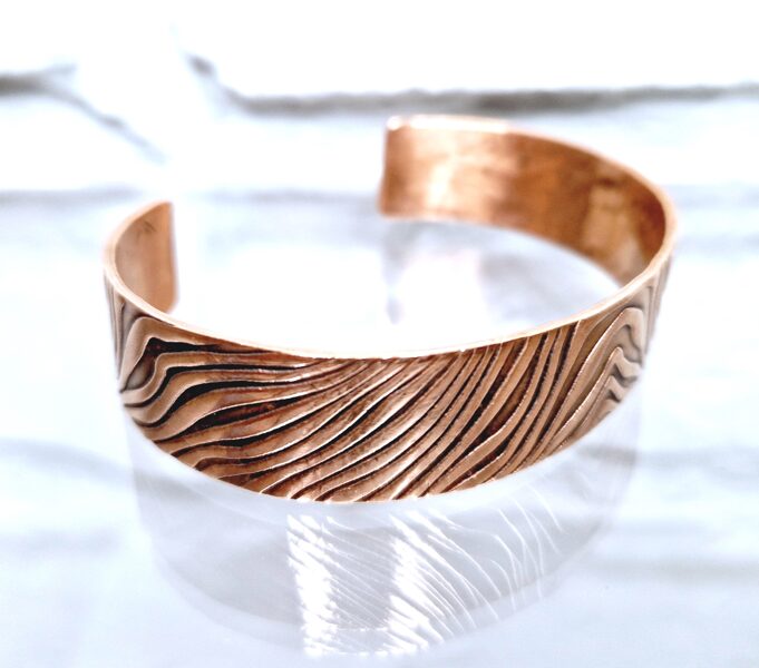 Bronze Cuff With Waved Ornament